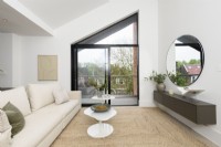 Living area with sliding glass doors onto a balcony